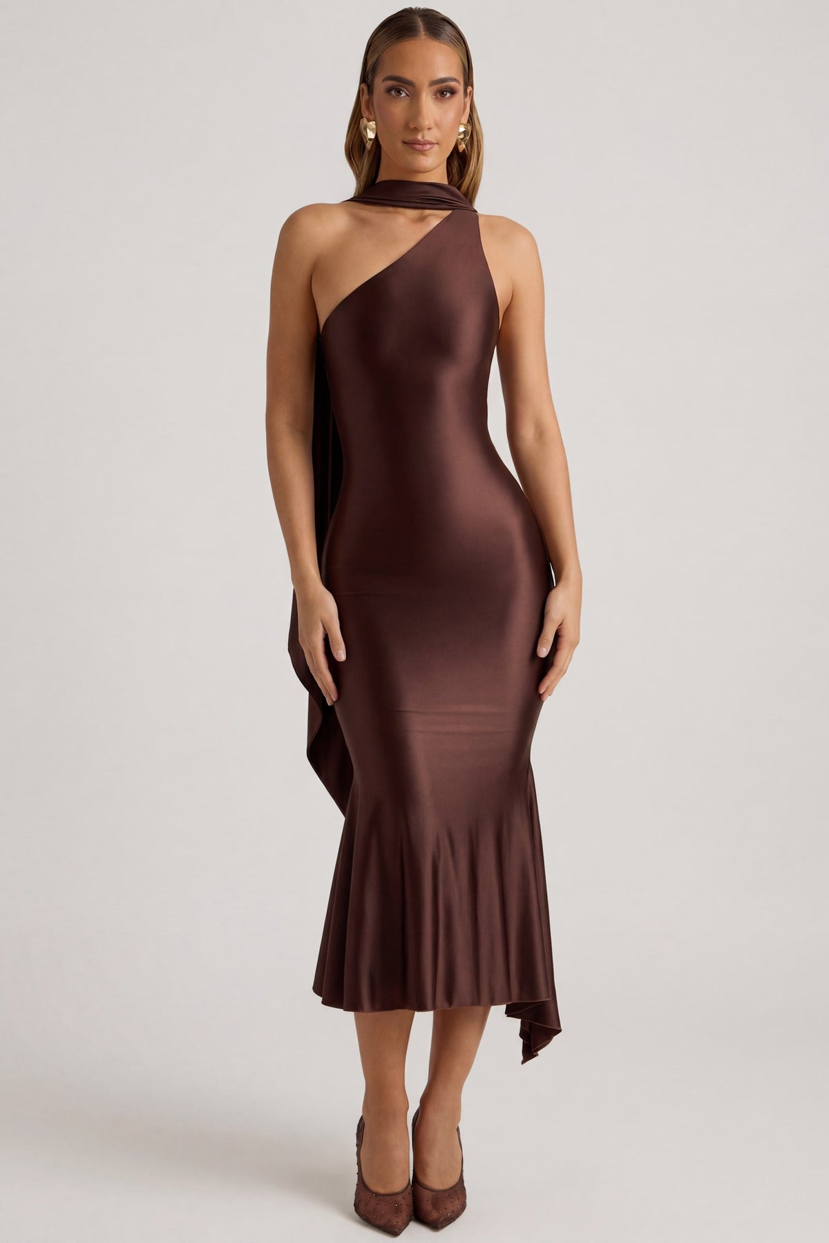 Oh Polly's Priscilla wearing the Shaya Midaxi Dress in Chocolate Brown Satin Jersey fabric perfect for holiday celebrations